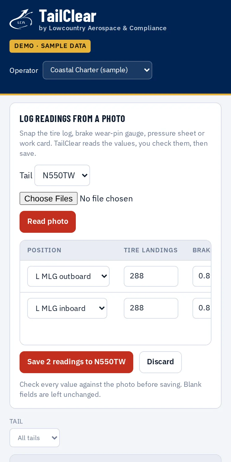 TailClear on a phone showing two wheel readings read from a photo, ready to check and save